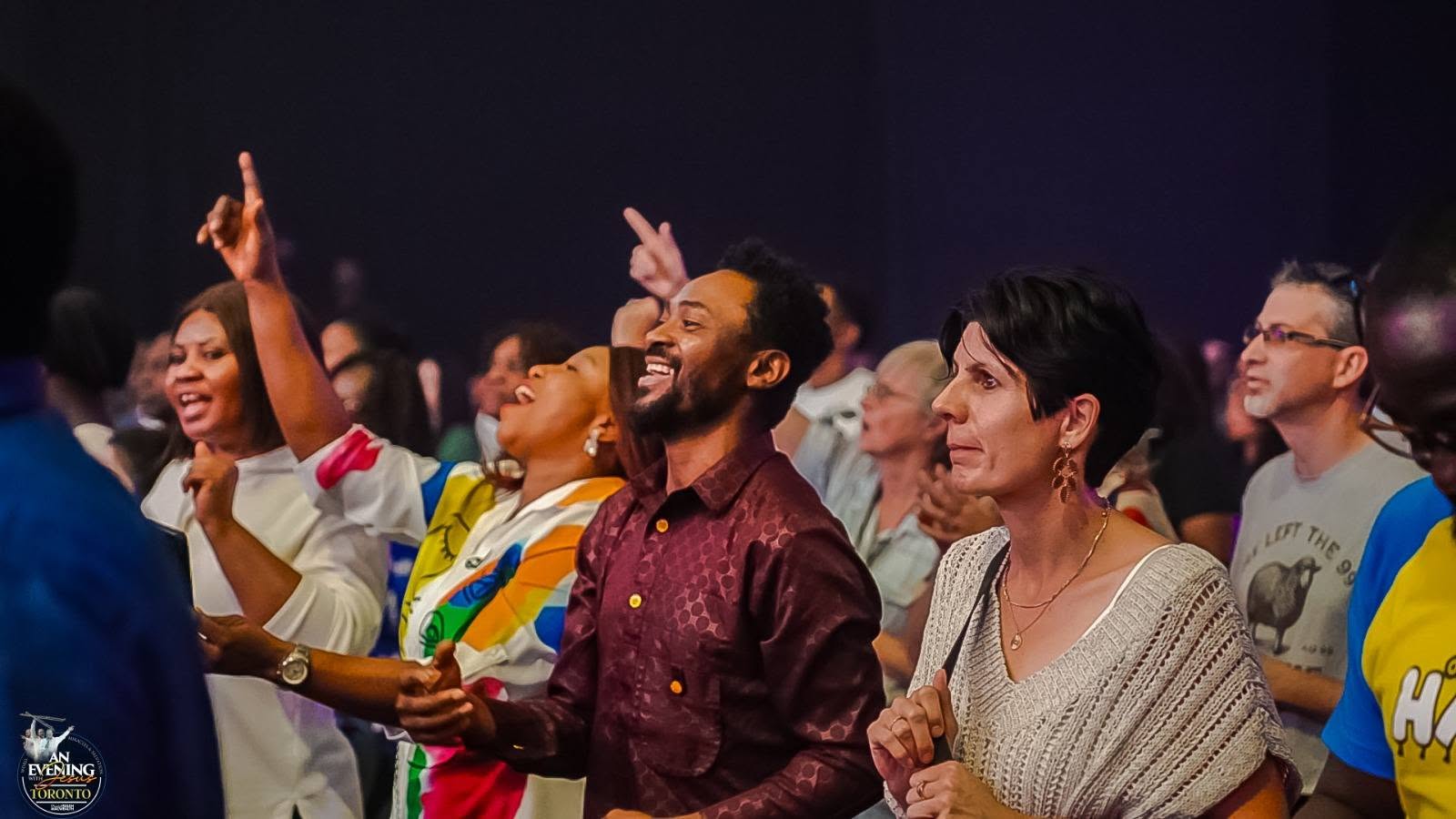 A diverse congregation worshipping at An Evening With Jesus, Toronto